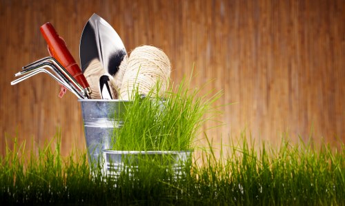 Tree surgery quotation and booking paperwork beside pruning tools
